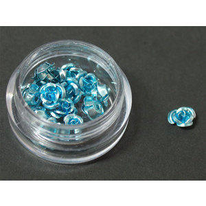 Decori per unghie in metallo a forma di rosellina. Colore azzurro.
